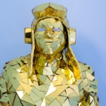 Detail view of top Golden Mirror man perfomance costume Pilot