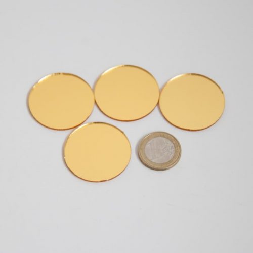 Big gold mirror pieces comparison with coin