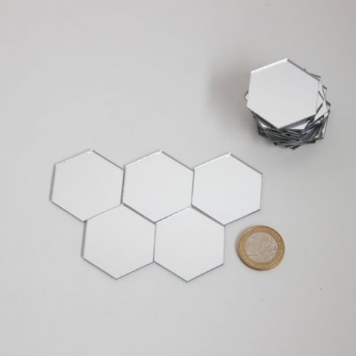 Big hexagon tiles comparison with coin