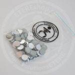 Small round form silver mirror pieces in pocket