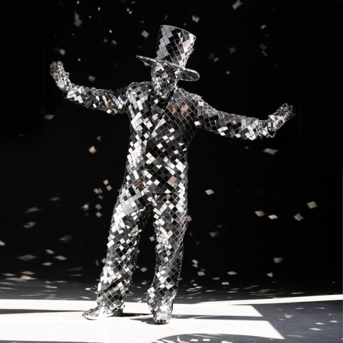 making pose in Mirror man glass man performance costume
