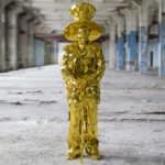 Big hat from above Golden Mirror man glass suit frrom front