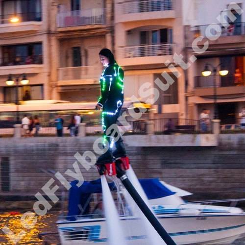 Day light flyboard performance in LED flyboard suit