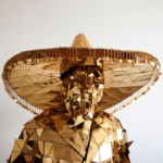 Golden Mirror man performance costume in sambrelllo from front