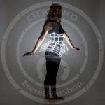 Glowing white corset model in a full height