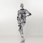 Model possing in a Disco ball sparkly mirror bodysuit costume from front in full size