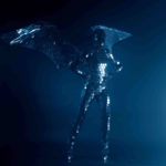 Mirror wings with remote controler posing in a dark plus light reflection