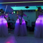 Eevnt with 3 music artist with vilon dressed into LED corsets