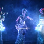 Live performance in glowing corset with smart controll
