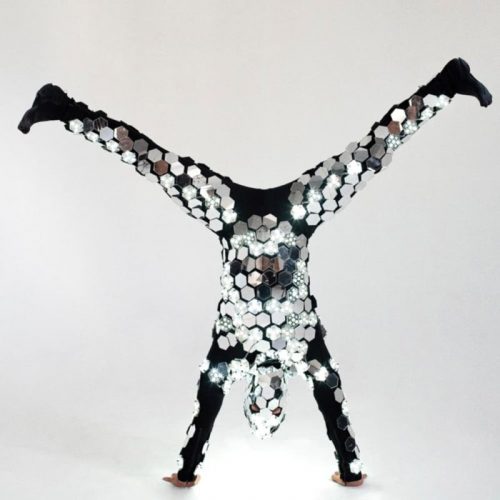 Acrobat makes hand stand in our LED mirror costume