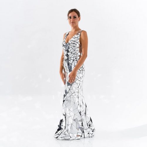 Model posing in Sequin mirror sleeveless dress