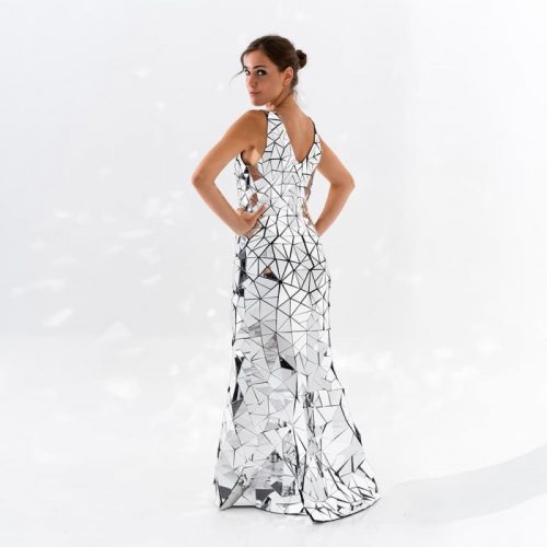 Model posing in Disco ball mirror sleeveless dress