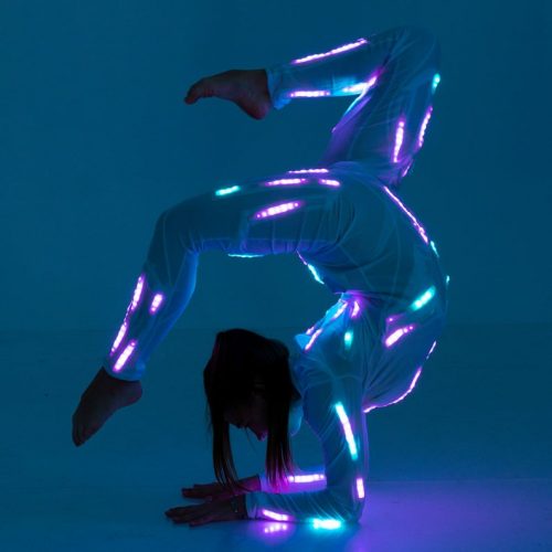 Making acrobtatic trick in Aerial LED light up gymnastics costume
