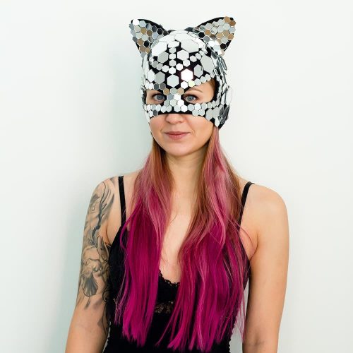 Model posing in Kitty mirror mask "Hexagon"