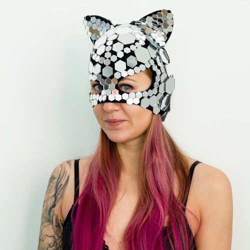Model posing in Kitty mirror mask "Hexagon" view from front