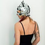 Model posing in Kitty mirror mask "Hexagon" view from side 2