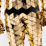 Waist area of Gold Triangle disco ball mirror bodysuit costume