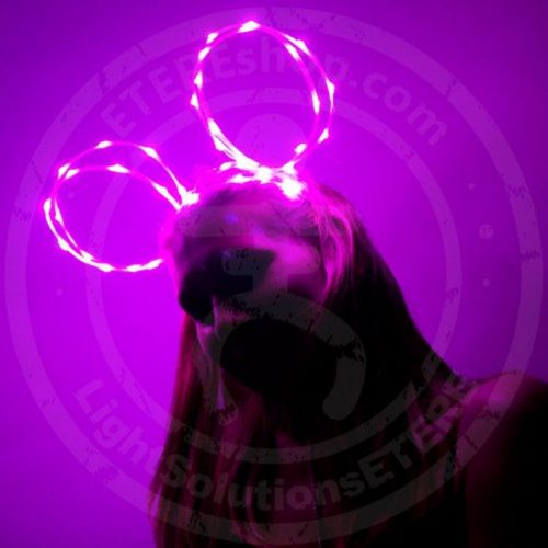 LED rave mask glowing in purple colour