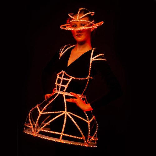 RED light up costume in dark studio