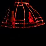 Light up skirt part of full dress glowing in a red colour