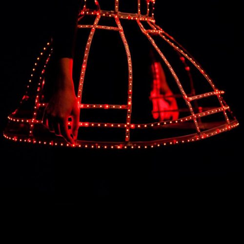 Light up skirt part of full dress glowing in a red colour