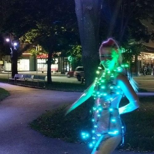 led rave burning man outfit on street