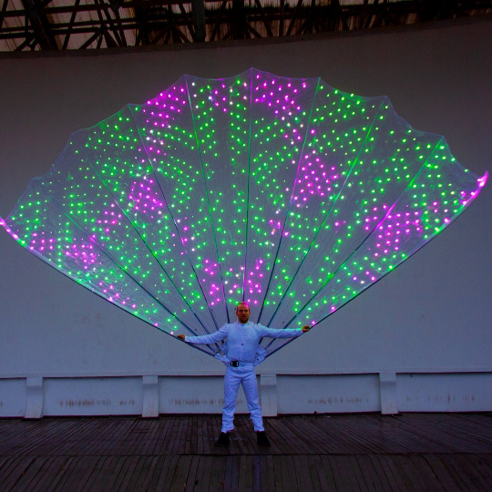 1000 LED Peacock Fan Tail Smart Costume on stage with green/purple effect