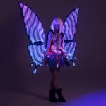 Glowing wings in the dark and a dress