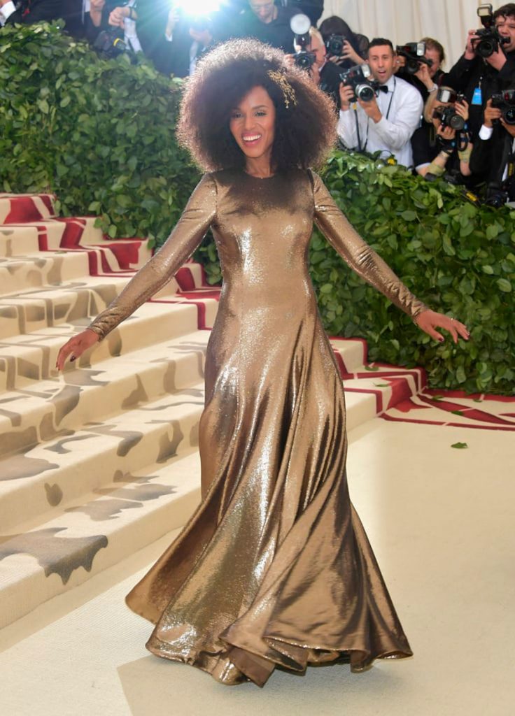 Kerry Washington in a long gold gown on the Met Gala red carpet