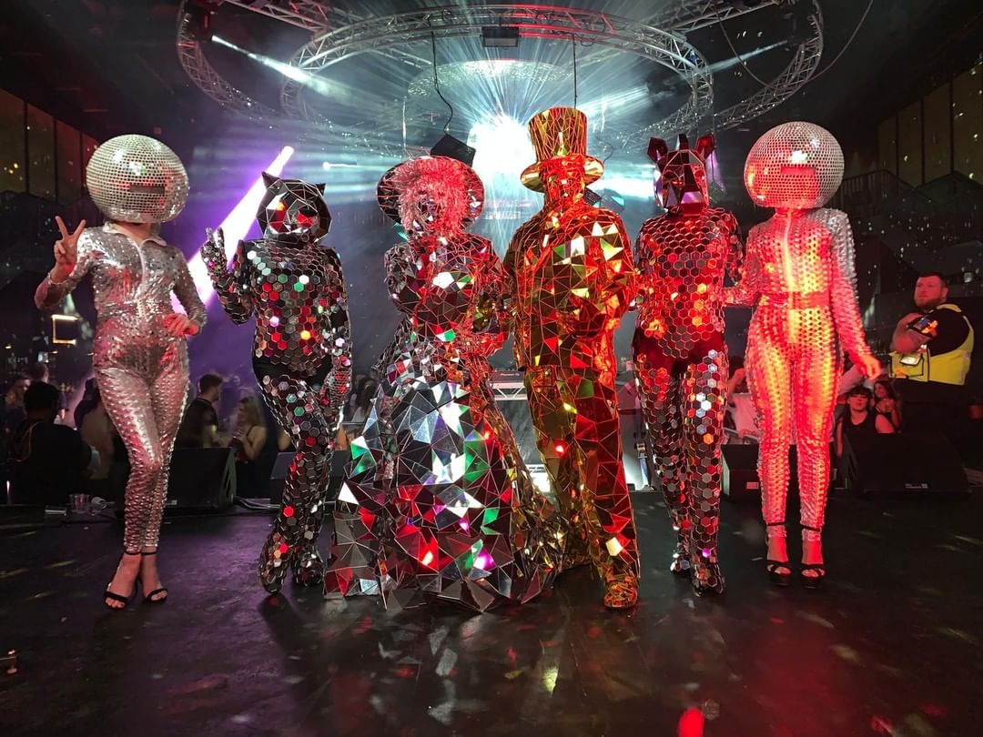 Mirror Costumes with a Disco Ball Effect by