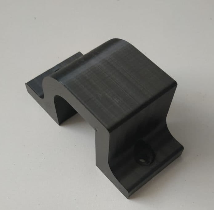 plastic part for mounting the drive for wings