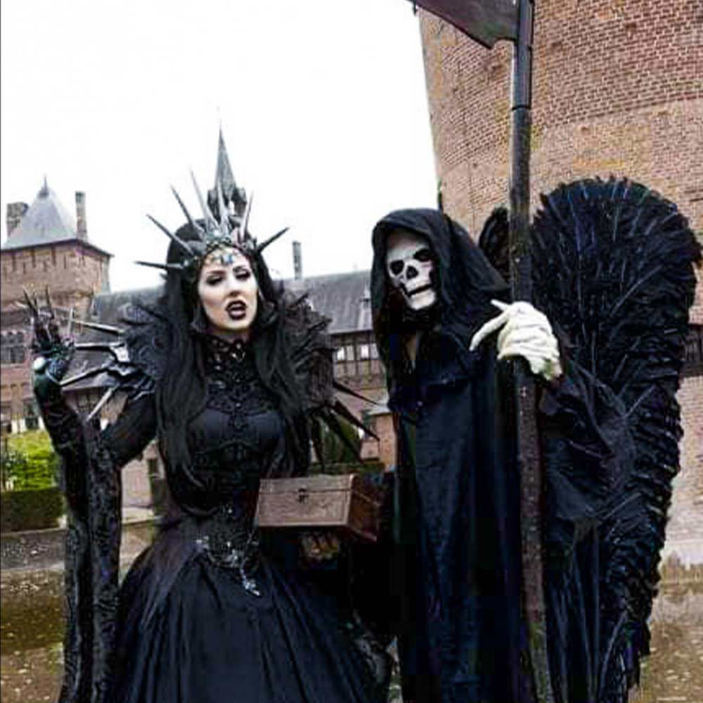 Grim-Reaper-and-the-Queen-of-Death-in-a-black-dress-with-dark-makeup-are-a-pair-of-Halloween-costumes.
