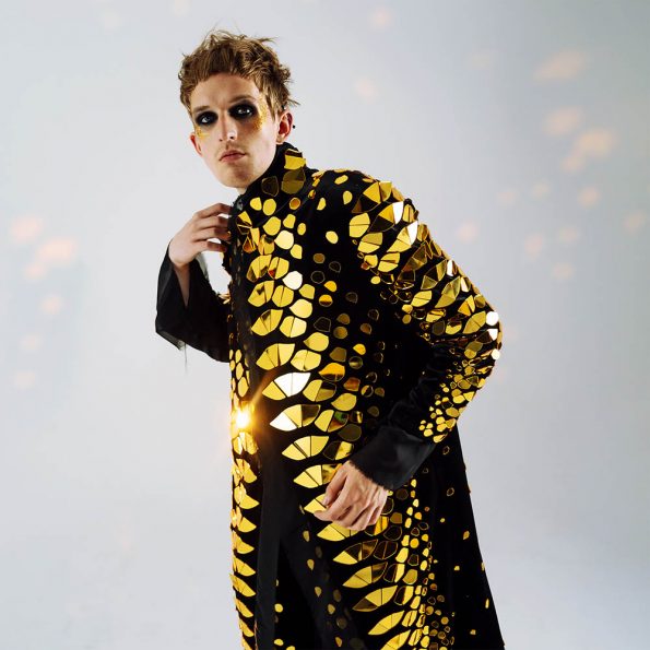 Men's costume with a gold mirror 