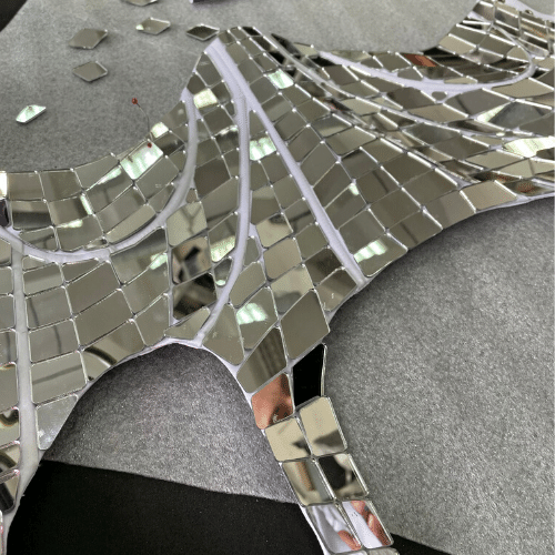 gluing-mirrors-on-a-sexy-corset