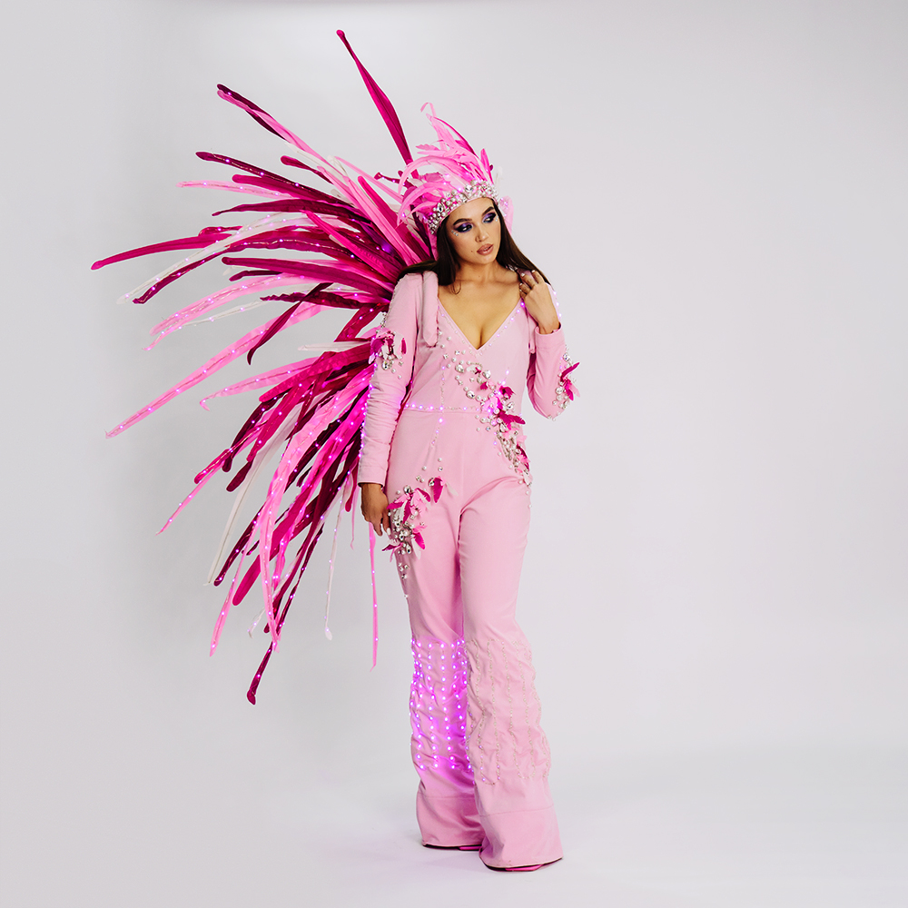 https://www.etereshop.com/wp-content/uploads/2022/12/Adult-Pink-Flamingo-Costume-Glows-in-the-Dark.jpg