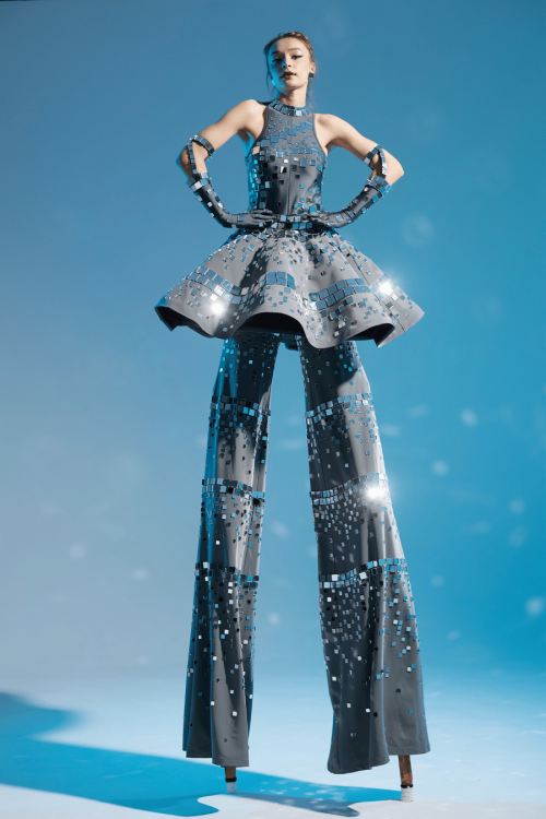 Mirror dress of stilt walkers disco ball front view