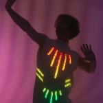 LED-gymnast-suit-glows-in-the-dark