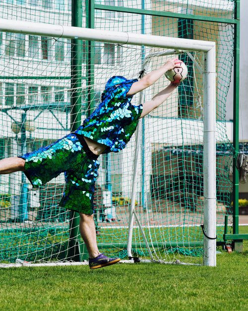 mirrored green soccer player costume for the festival